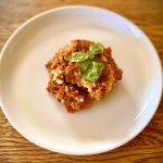 Baked ricotta and aubergine with tomato sauce and pangritata 